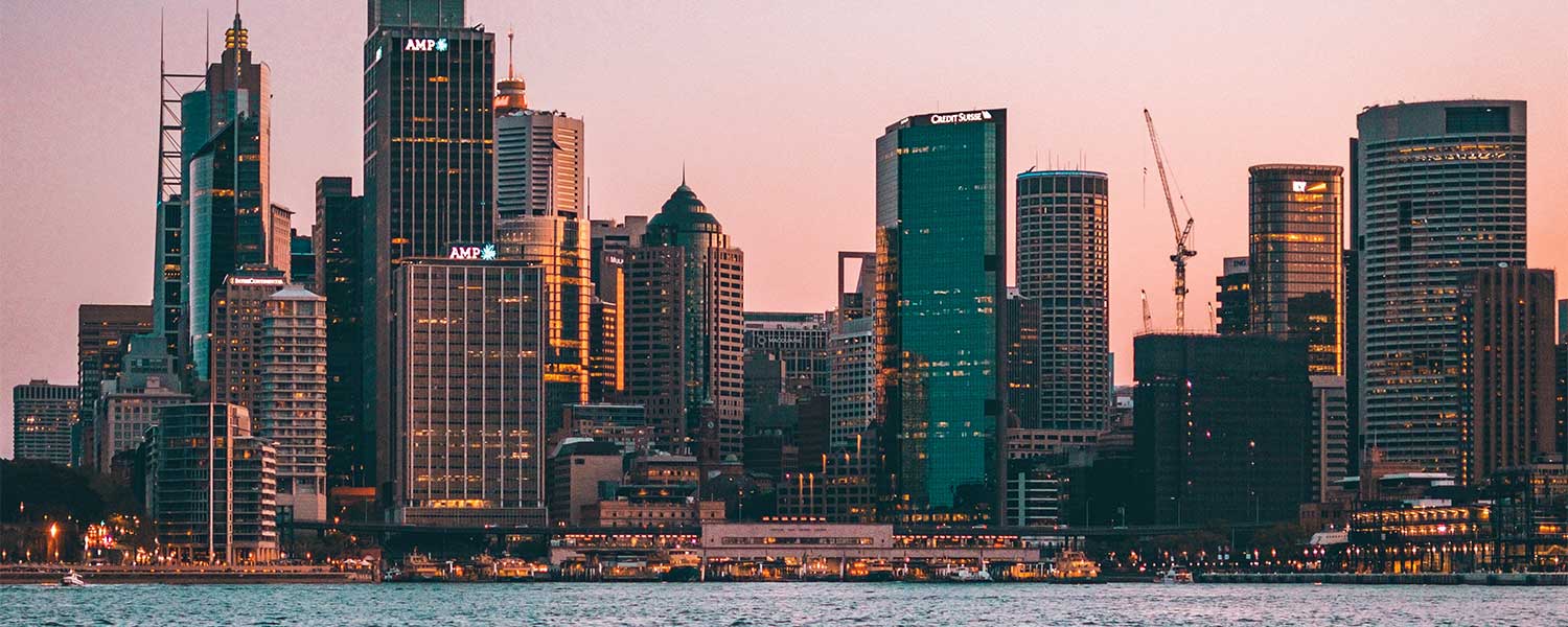 Godfrey Remuneration Group – The Sydney CBD skyline at dusk